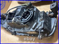 Bmw e87 one series pair of headlights wth brackets & wire loom clips connectors
